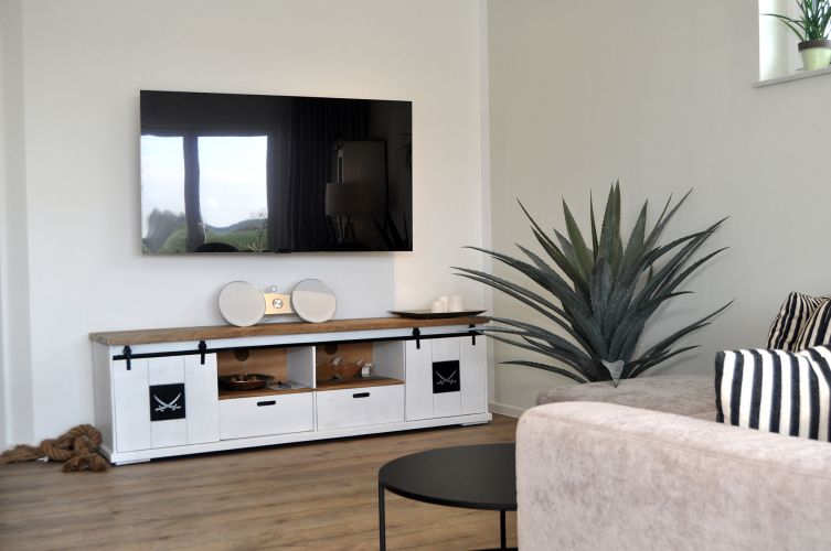 Ferienhaus Lieblingsplatz der Wohnbereich TV