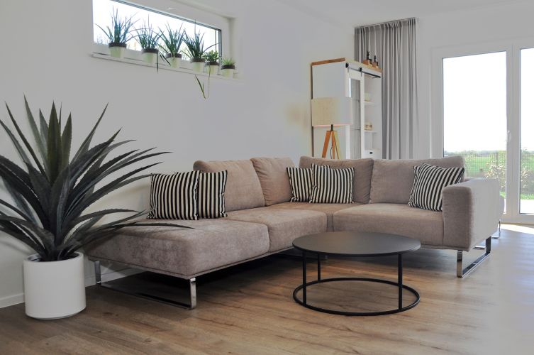 Ferienhaus Lieblingsplatz Wohnbereich mit der Couch